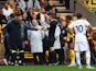 Wolverhampton Wanderers' Matheus Nunes is shown a red card by referee Michael Salisbury on March 18, 2023