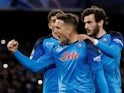 Napoli's Piotr Zielinski celebrates scoring their third goal with teammates on March 15, 2023