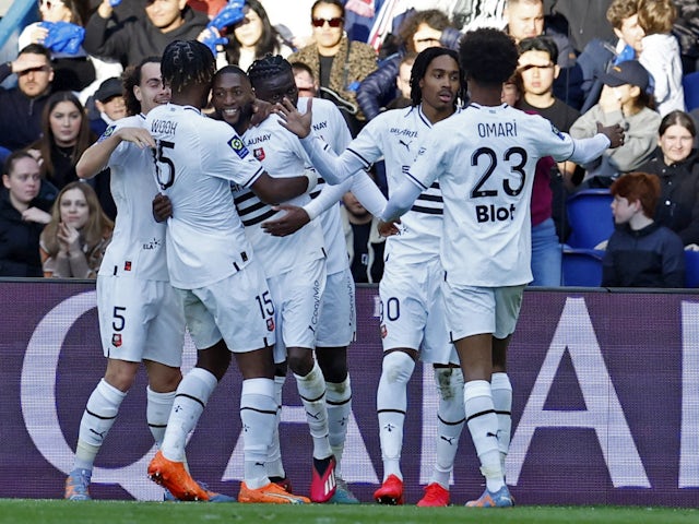 Stade Rennes' Karl Toko Ekambi celebrates scoring their first goal with teammates on March 19, 2023