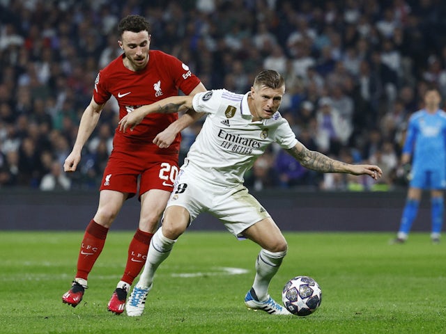 Liverpool's Diogo Jota in action with Real Madrid's Toni Kroos on March 15, 2023