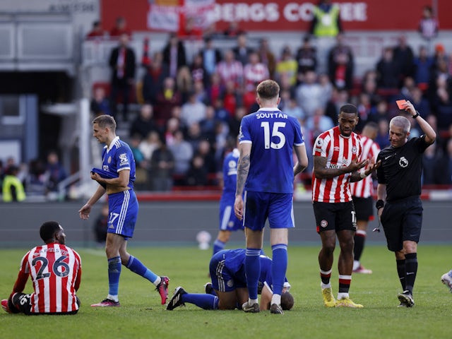 Brentford's Shandon Baptiste is shown a red card by referee Darren Bond on March 18, 2023