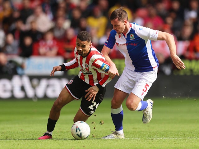 Sheffield United's Iliman Ndiaye in action with Blackburn Rovers' Dominic Hyam on March 19, 2023