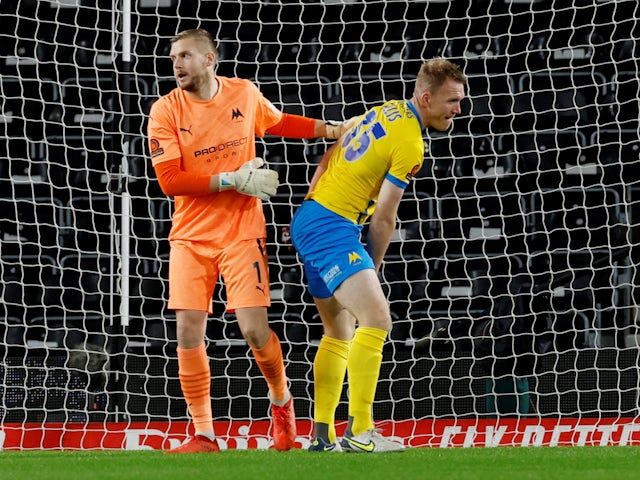 Torquay United's Mark Ellis reacts after scoring an own goal on November 15, 2022