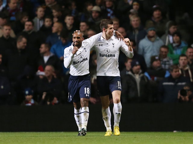 Gareth Bale of Tottenham Hotspur celebrates his goal with Jermain Defoe in December 2012