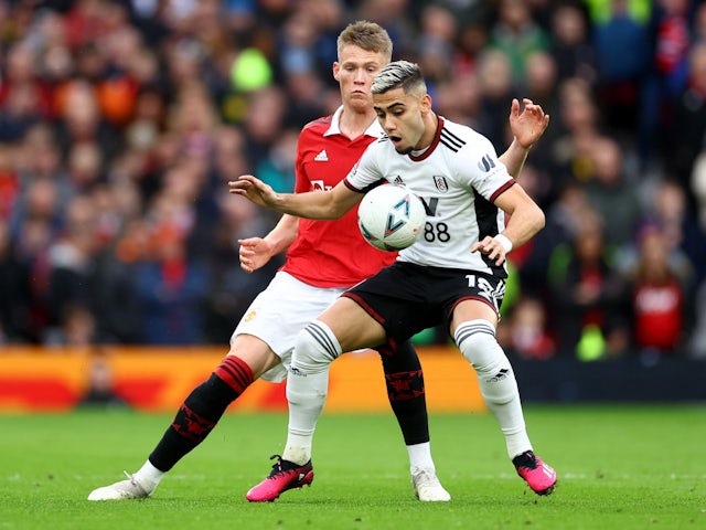 Fulham's Andreas Pereira in action with Manchester United's Scott McTominay on March 19, 2023