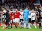 Manchester United beat nine-man Fulham in chaotic FA Cup quarter-final