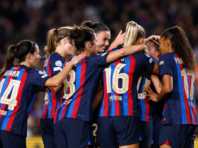 Barcelona women's players celebrate after Asisat Oshoala scores their second goal on December 21, 2022 