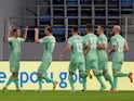 Belarus' Ivan Bakhar celebrates scoring their first goal with teammates on September 25, 2022