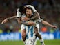 Argentina's Lionel Messi celebrates scoring their second goal with Rodrigo De Paul on March 23, 2023