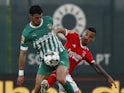 Rio Ave's Andre Pereira in action with Benfica's Chiquinho on April 2, 2023