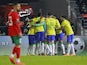 Brazil's Casemiro celebrates scoring their first goal with teammates on March 25, 2023