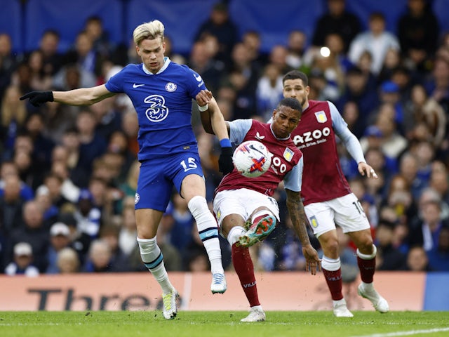 Chelsea's Mykhaylo Mudryk in action with Aston Villa's Ashley Young on April 1, 2023