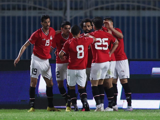 Egypt's Mohamed Salah celebrates scoring their first goal with teammates on March 24, 2023