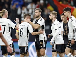Germany's Niclas Fullkrug celebrates scoring their first goal with Joshua Kimmich on March 25, 2023