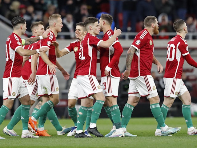 Hungary's Balint Vecsei celebrates scoring their first goal with teammates on March 27, 2023