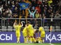 Kazakhstan's Askhat Tagybergen celebrates scoring their second goal with teammates on March 26, 2023