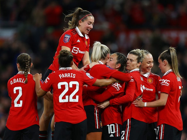 Manchester United Women's Katie Zelem celebrates scoring their first goal with teammates on March 25, 2023