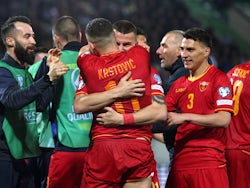 Montenegro's Nikola Krstovic celebrates scoring their first goal with teammates on March 24, 2023