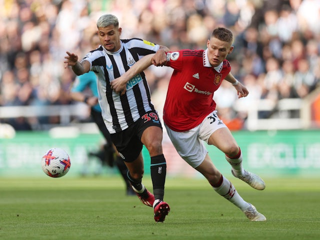 Newcastle United's Bruno Guimaraes in action with Manchester United's Scott McTominay on April 2, 2023