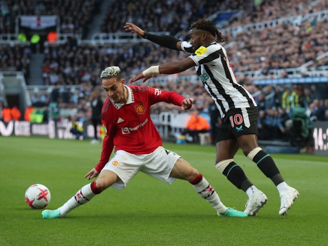 Newcastle United's Allan Saint-Maximin in action with Manchester United's Antony on April 2, 2023