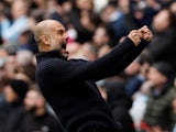 Manchester City manager Pep Guardiola celebrates their first goal on April 1, 2023