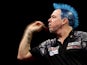 Peter Wright in action during during his quarter final match against Jonny Clayton on March 23, 2023