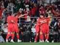 South Korea's Son Heung-min celebrates with teammates after scoring their first goal on March 24, 2023
