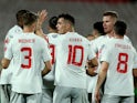 Switzerland's Granit Xhaka celebrates scoring their fourth goal with teammates on March 25, 2023