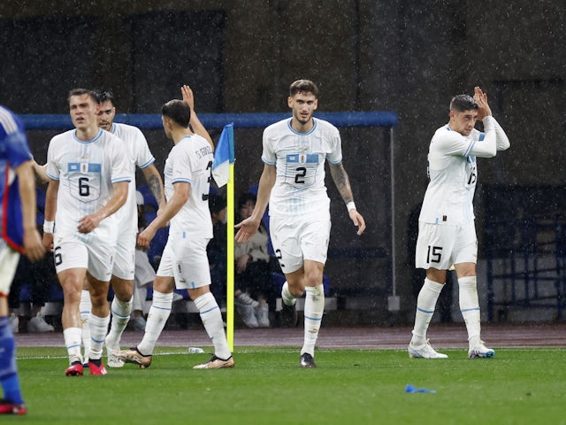 Uruguay's Federico Valverde celebrates with teammates after scoring their first goal on March 24, 2023