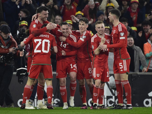 Wales celebrate scoring against Latvia in their Euro 2024 qualifier on March 28, 2023.