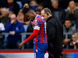Crystal Palace's Wilfried Zaha walks off after sustaining an injury on April 1, 2023