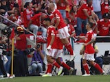 Benfica's Goncalo Ramos celebrates scoring their first goal with teammates on April 7, 2023