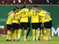 Borussia Dortmund team huddle before the match on April 5, 2023