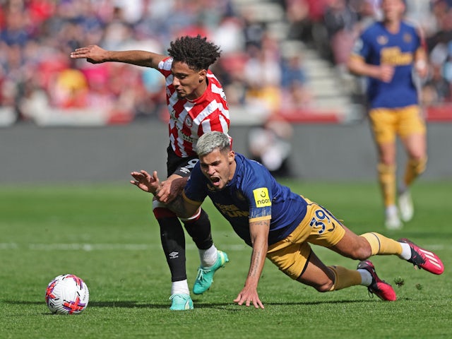 Newcastle United's Bruno Guimaraes in action with Brentford's Kevin Schade on April 8, 2023