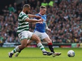 Rangers' Ryan Kent in action with Celtic's Cameron Carter-Vickers on April 8, 2023