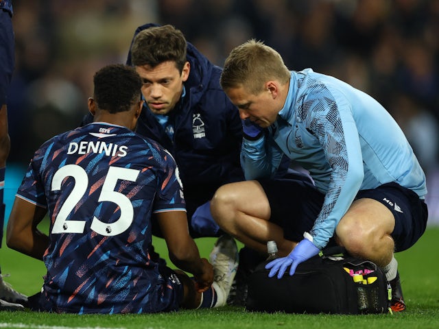 Nottingham Forest's Emmanuel Dennis receives medical attention on April 4, 2023