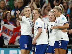England Women's Ella Toone celebrates scoring their first goal with teammates on April 6, 2023