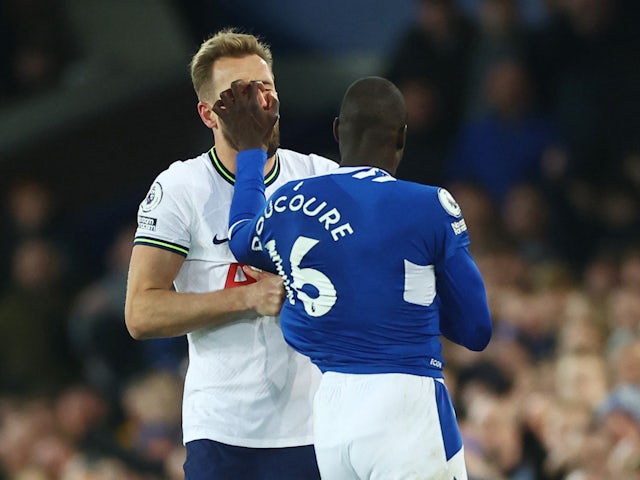 Everton's Abdoulaye Doucoure clashes with Tottenham Hotspur's Harry Kane and is later shown a red card on April 3, 2023