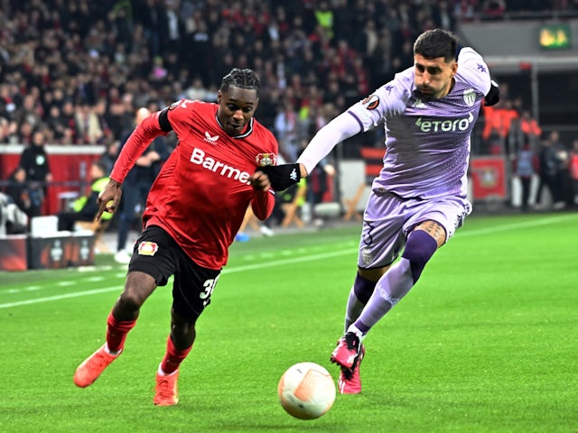 Bayer Leverkusen's Jeremie Frimpong in action with AS Monaco's Guillermo Maripan on February 16, 2023