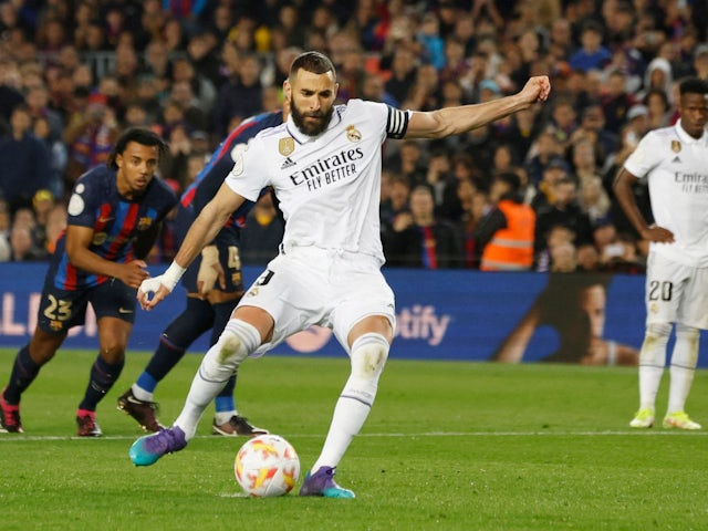 Real Madrid's Karim Benzema scores their third goal from the penalty spot on April 5, 2023