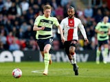Manchester City's Kevin De Bruyne in action with Southampton's Theo Walcott on April 8, 2023