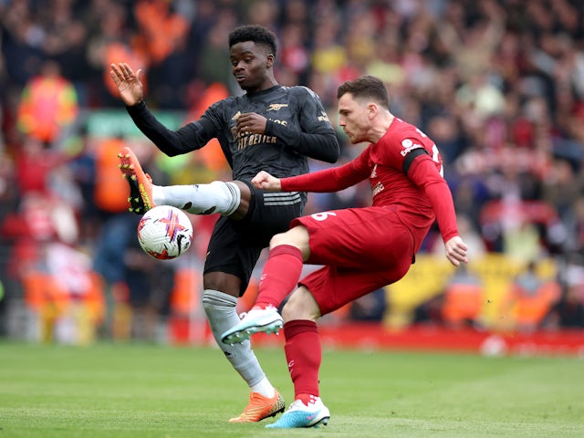 Liverpool's Andy Robertson in action with Arsenal's Bukayo Saka on April 9, 2023