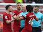 Liverpool players remonstrate with referee Paul Tierney on April 9, 2023