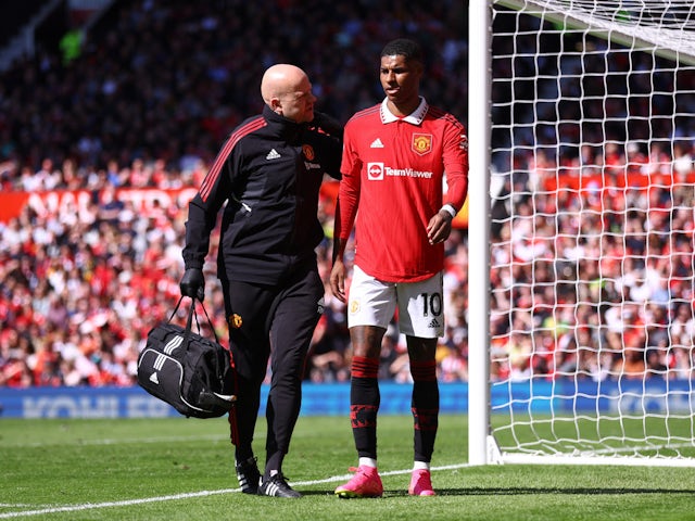 Manchester United forward Marcus Rashford goes off injured against Everton on April 8, 2023