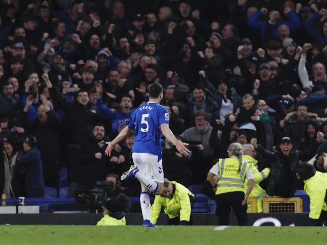  Everton's Michael Keane celebrates scoring their first goal on April 3, 2023