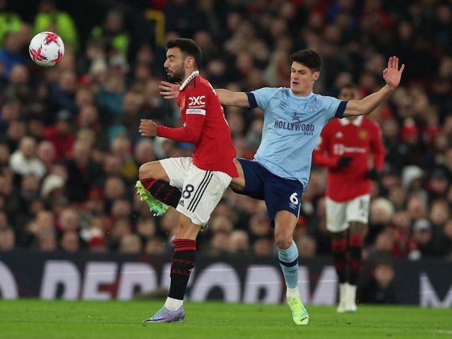 Manchester United's Bruno Fernandes in action with Brentford's Christian Norgaard on April 5, 2023