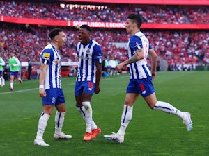 Porto beat Benfica to keep title race alive