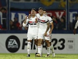 Sao Paulo's Erison celebrates scoring their second goal with teammates on April 6, 2023