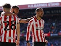Sheffield United's Iliman Ndiaye celebrates with teammates after scoring their first goal on April 7, 2023
