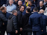 Tottenham Hotspur's Cristian Stellini clashes with Brighton & Hove Albion's Roberto De Zerbi on April 8, 2023